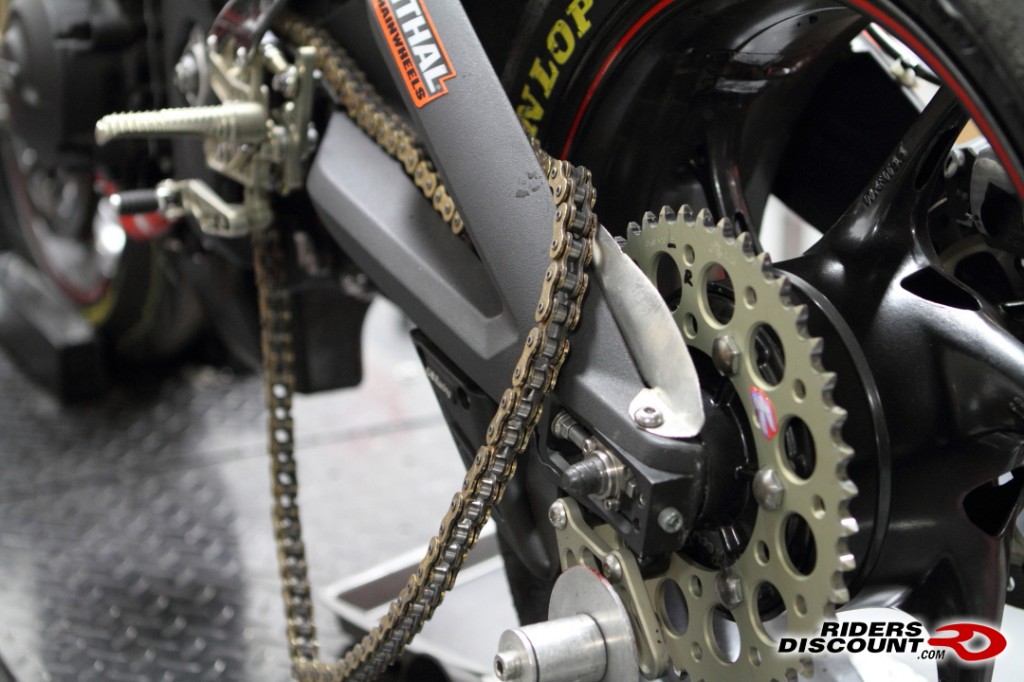 Here we installed a custom chain guide.  This prevents the falling into the space between the wheel and swingarm making it easier for the rear wheel changer during the pit stop.